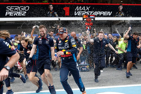 Max Verstappen celebrates with team